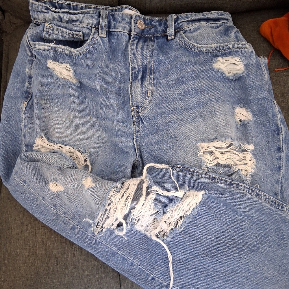 Distressed Blue Denim Jeans